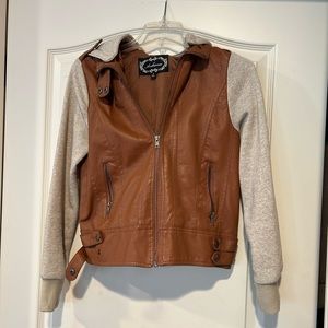 Faux brown leather jacket with sweatshirt sleeves and hood.